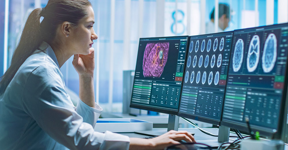 medical imaging research scientist evaluating brain scans